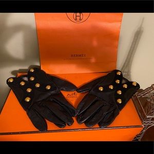 Hermes black leather gloves with chic gold design